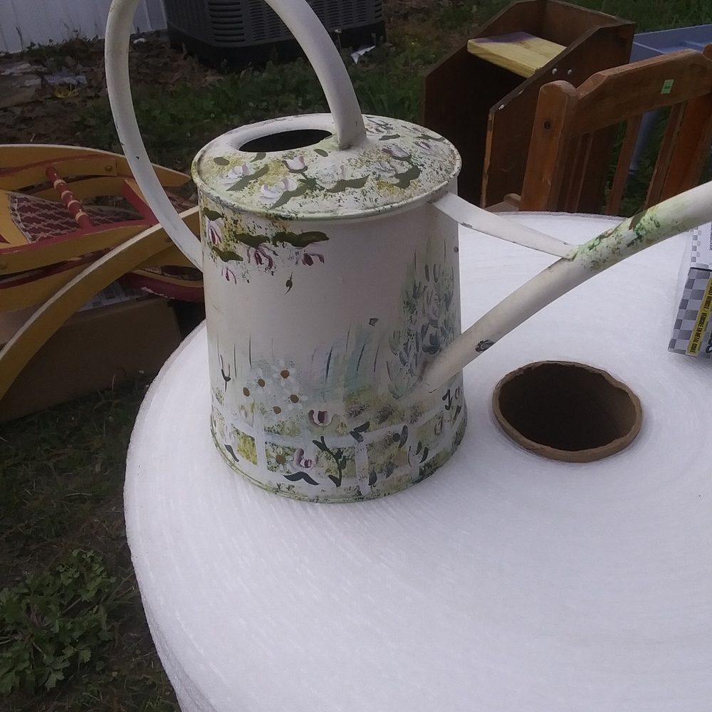 Painted water can